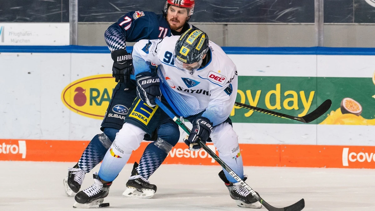 Kampf um den Puck zwischen Chris Bourque (EHC Red Bull Muenchen) und Wojciech Stachowiak (ERC Ingolstadt Panther) im Spiel Red Bull Muenchen gegen die Ingolstadt Panther am 21.02.2020.
Foto: Heike Feiner/Eibner Pressefoto | Verwendung weltweit