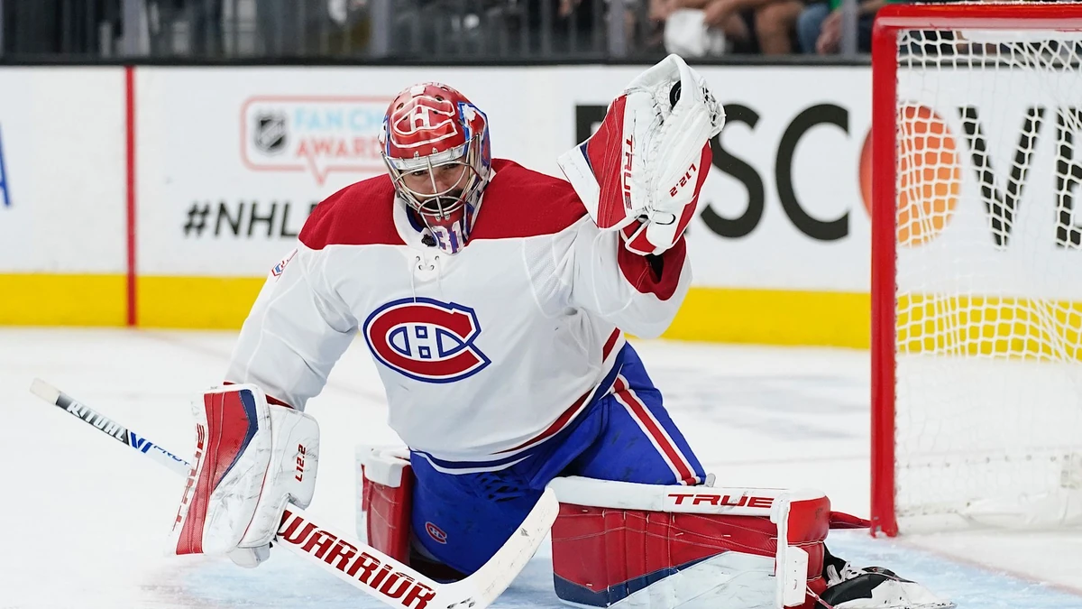 Montreal Canadiens goaltender Carey Price (31) blocks a shot by the Vegas Golden Knights during the second period in Game 1 of an NHL hockey Stanley Cup semifinal playoff series Monday, June 14, 2021, in Las Vegas. (AP Photo/John Locher)