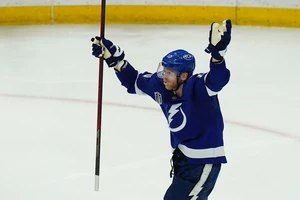 Tampa Bay Lightning right wing Corey Perry (10) celebrates a goal against the Colorado Avalanche during the second period in Game 3 of the NHL hockey Stanley Cup final Monday, June 20, 2022, in Tampa, Fla. (AP Photo/Chris O'Meara)