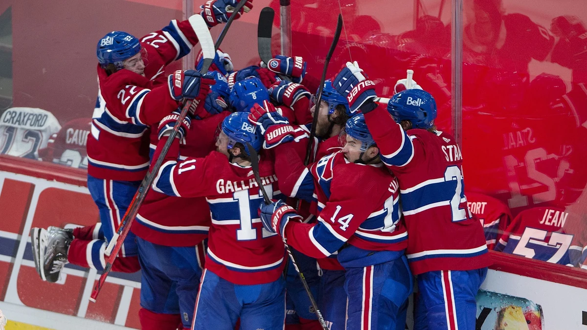 THE CANADIAN PRESS 2021-06-24. Montreal Canadiens players celebrate after defeating the Vegas Golden Knights following overtime NHL Stanley Cup playoff hockey semifinal action Thursday, June 24, 2021 in Montreal. THE CANADIAN PRESS/Ryan Remiorz URN:60560226