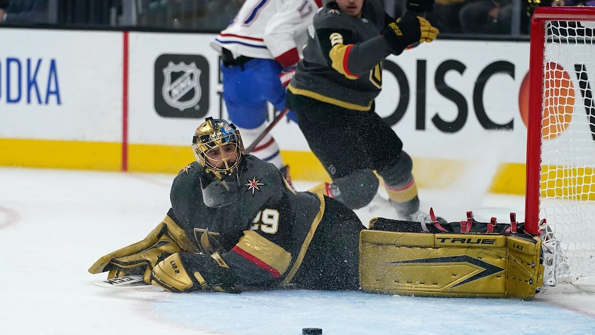 Vegas Golden Knights goaltender Marc-Andre Fleury (29) makes a stop during the first period in Game 5 of an NHL hockey Stanley Cup semifinal playoff series against the Montreal Canadiens Tuesday, June 22, 2021, in Las Vegas. (AP Photo/John Locher)