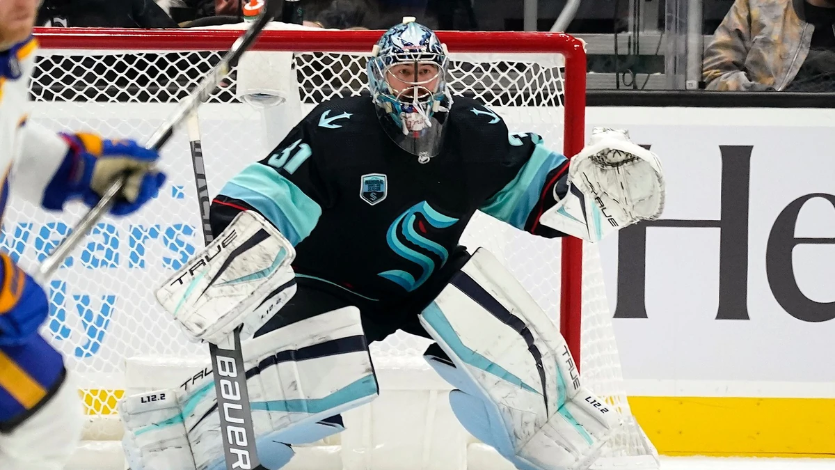Seattle Kraken goaltender Philipp Grubauer in action against the Buffalo Sabres in a NHL hockey game Thursday, Nov. 4, 2021, in Seattle. (AP Photo/Elaine Thompson)