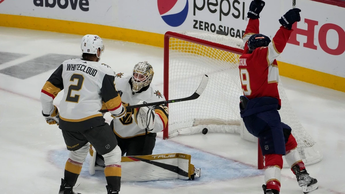 Florida Panthers left wing Matthew Tkachuk (19) celebrates the game winning goal by teammate Carter Verhaeghe during overtime in Game 3 of the NHL hockey Stanley Cup Finals, Thursday, June 8, 2023, in Sunrise, Fla. The Florida Panthers defeated the Vegas Golden Knights 3-2. (AP Photo/Rebecca Blackwell)