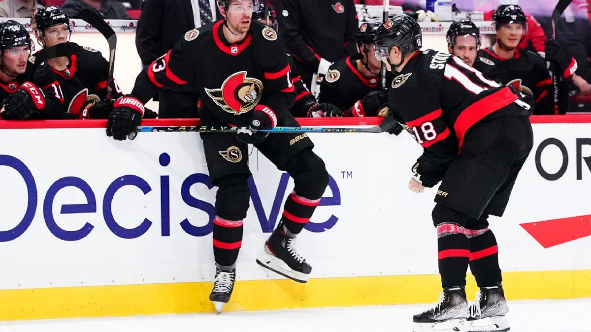 Ottawa Senators' Tim Stützle (18) skates to the bench with an unknown injury while taking on the Dallas Stars during the second period of an NHL hockey game, Sunday, Oct. 17, 2021, in Ottawa, Ontario. (Sean Kilpatrick/The Canadian Press via AP)